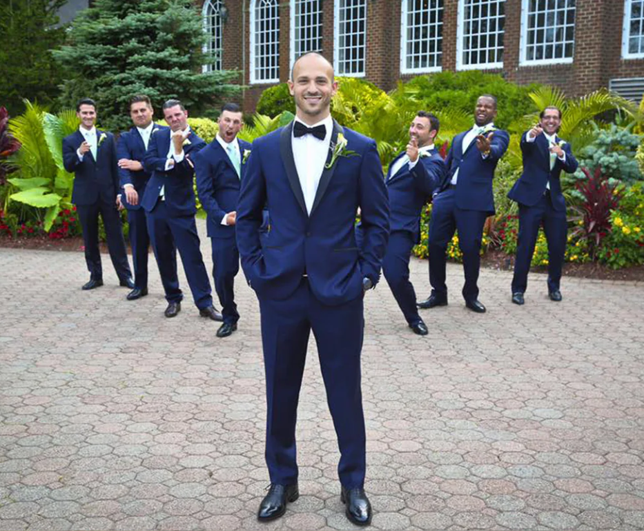 Groom and groomsmen wearing wedding suits from The Suit Spot in Astoria, Queens